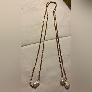 Rose gold wrap necklace with three fresh water pearls…59 inches long